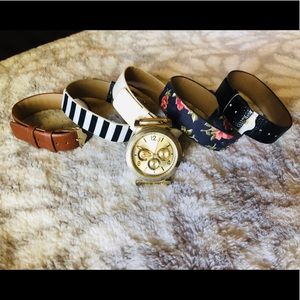 Aldo gold watch with 5 interchangeable bands.